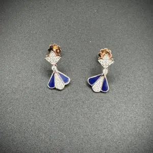 Elegant silver and blue angel-shaped earrings with rose gold accents.